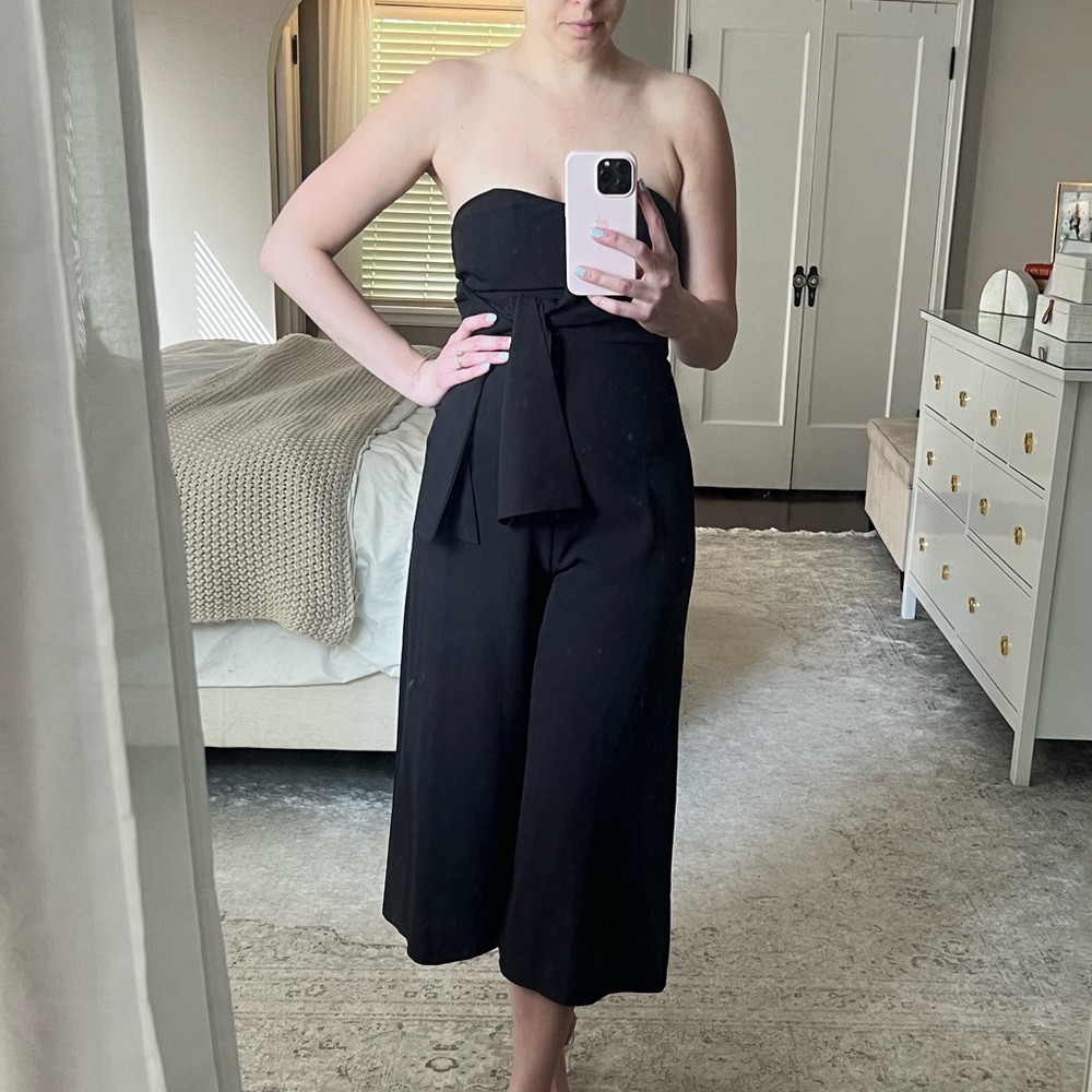 Black jumpsuit with bow detail